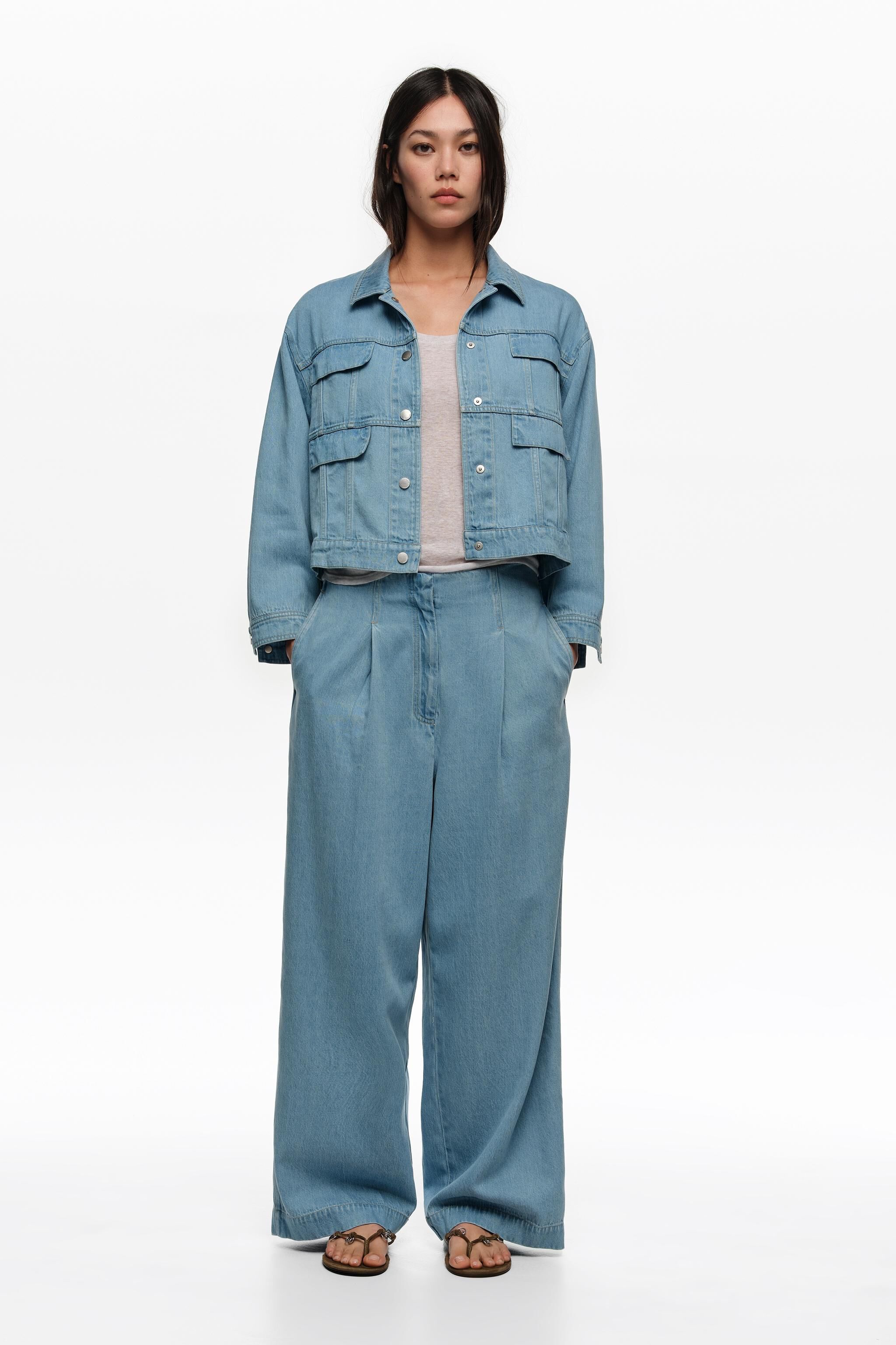 Ljusblå fluid denim raka byxor med vikar