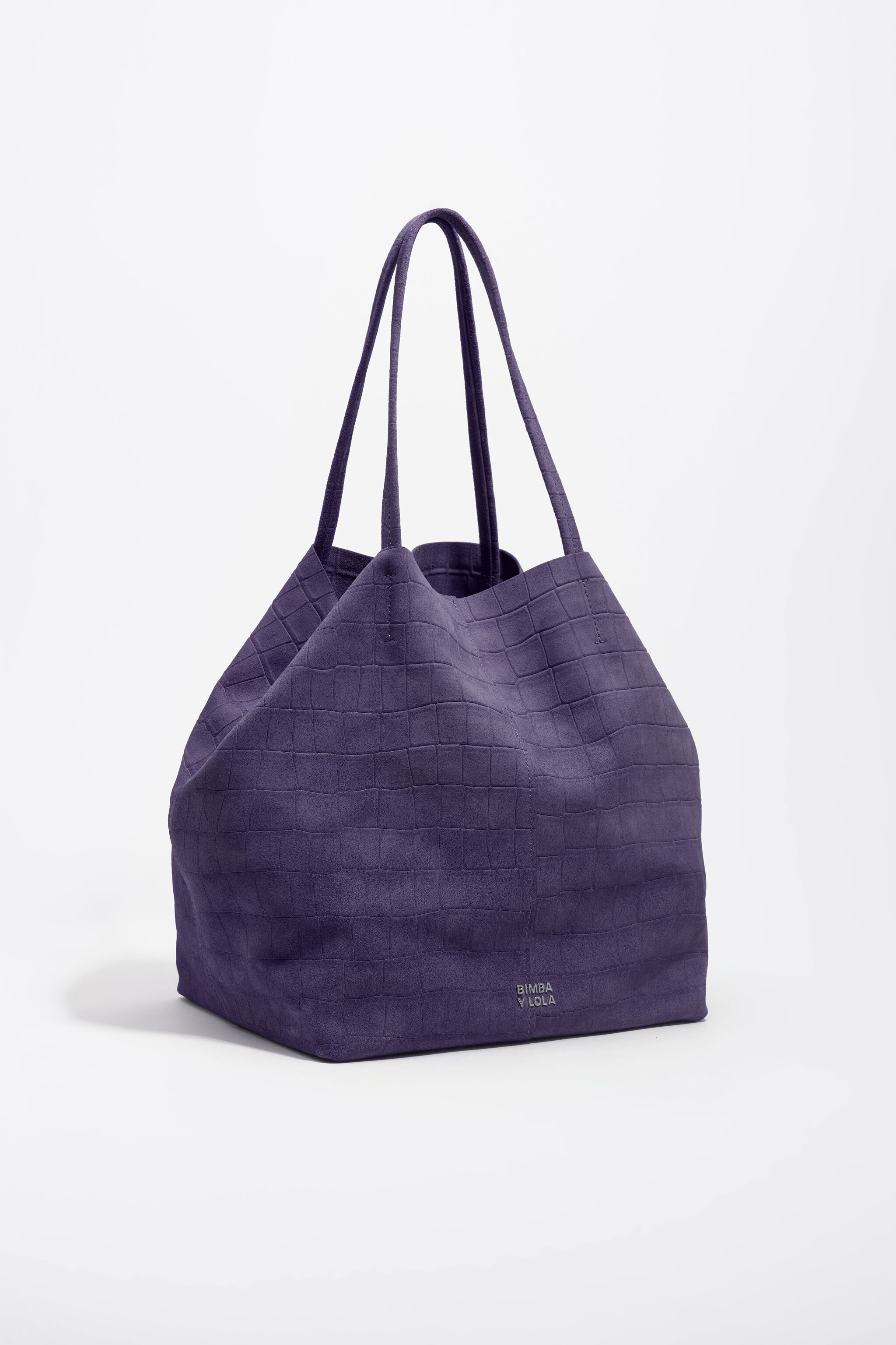 Stor säckbag i läder med lila imitat krokodilskinn