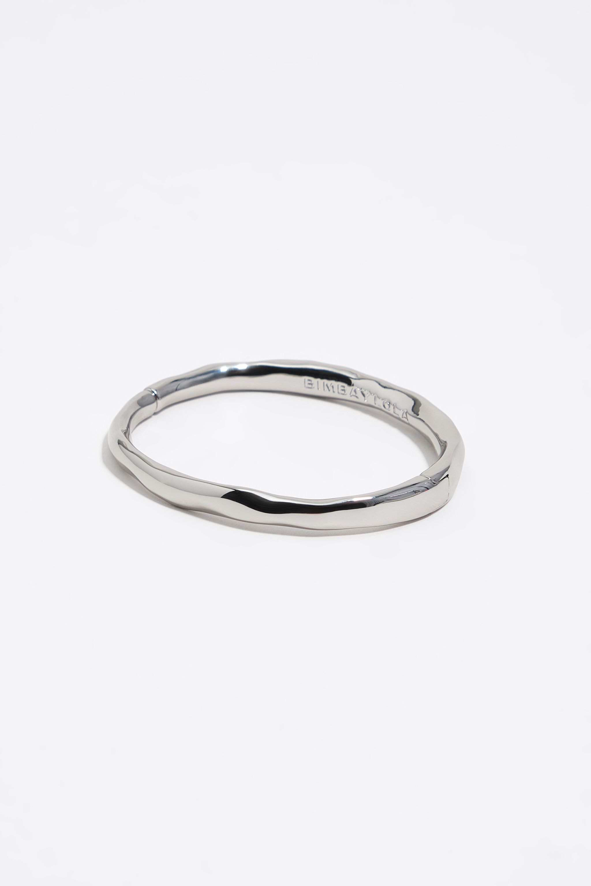 Oregelbunden silverarmband