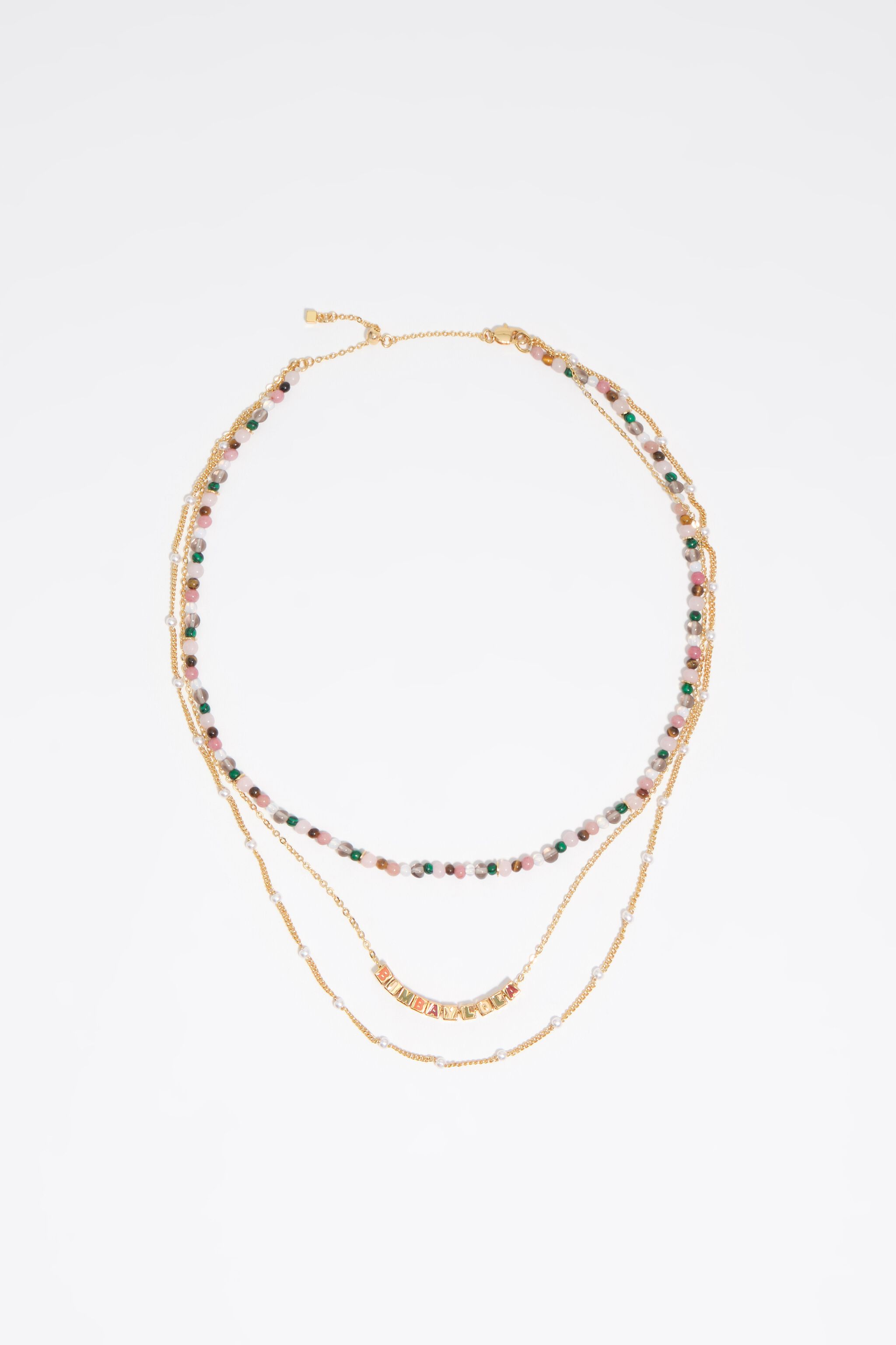 Trippelkettle halsband med stenar och logotyp