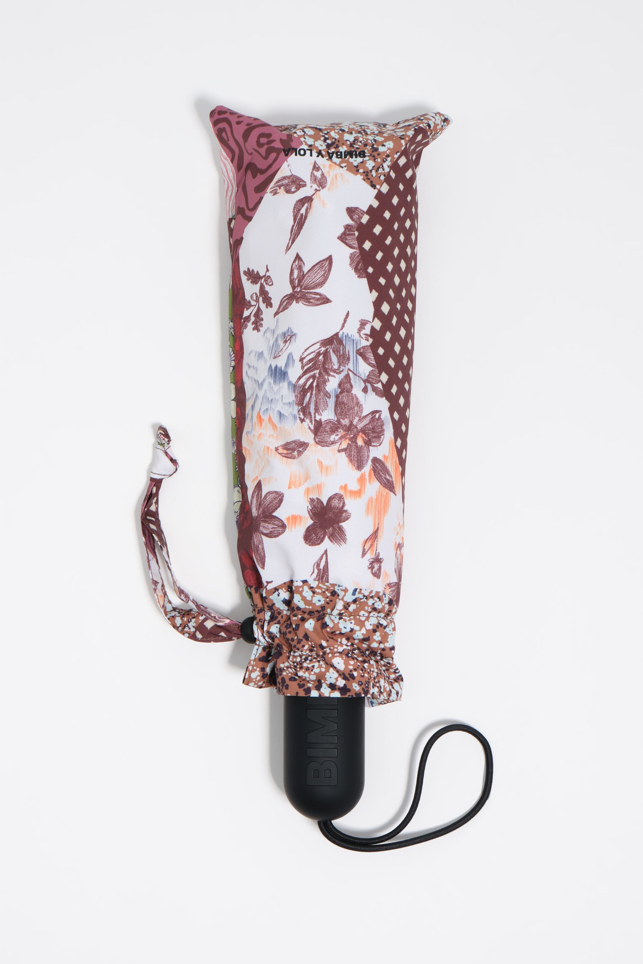 Patchworkmönstrad paraply