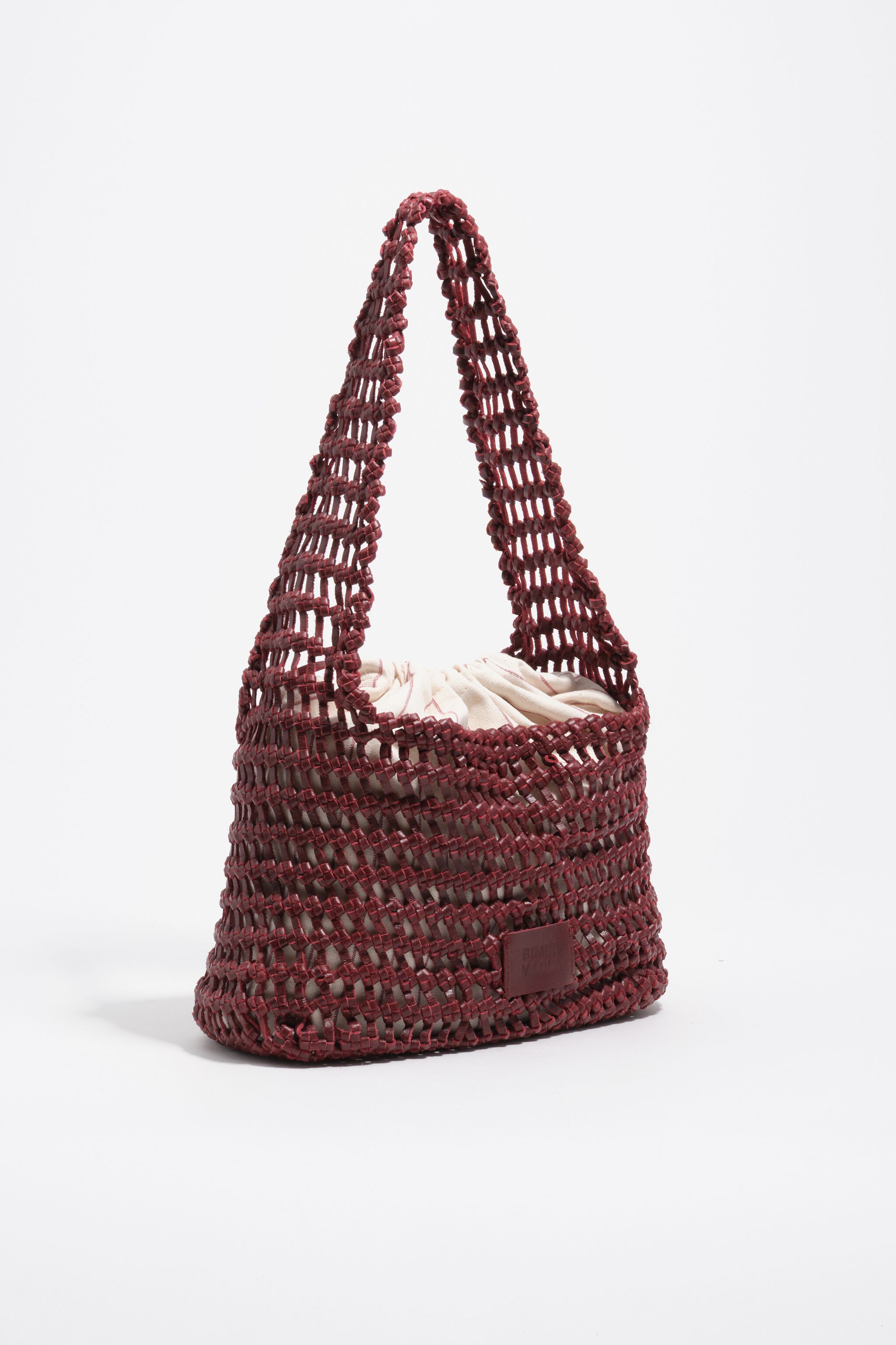 Mörk cherry läder vevad medelstor bag
