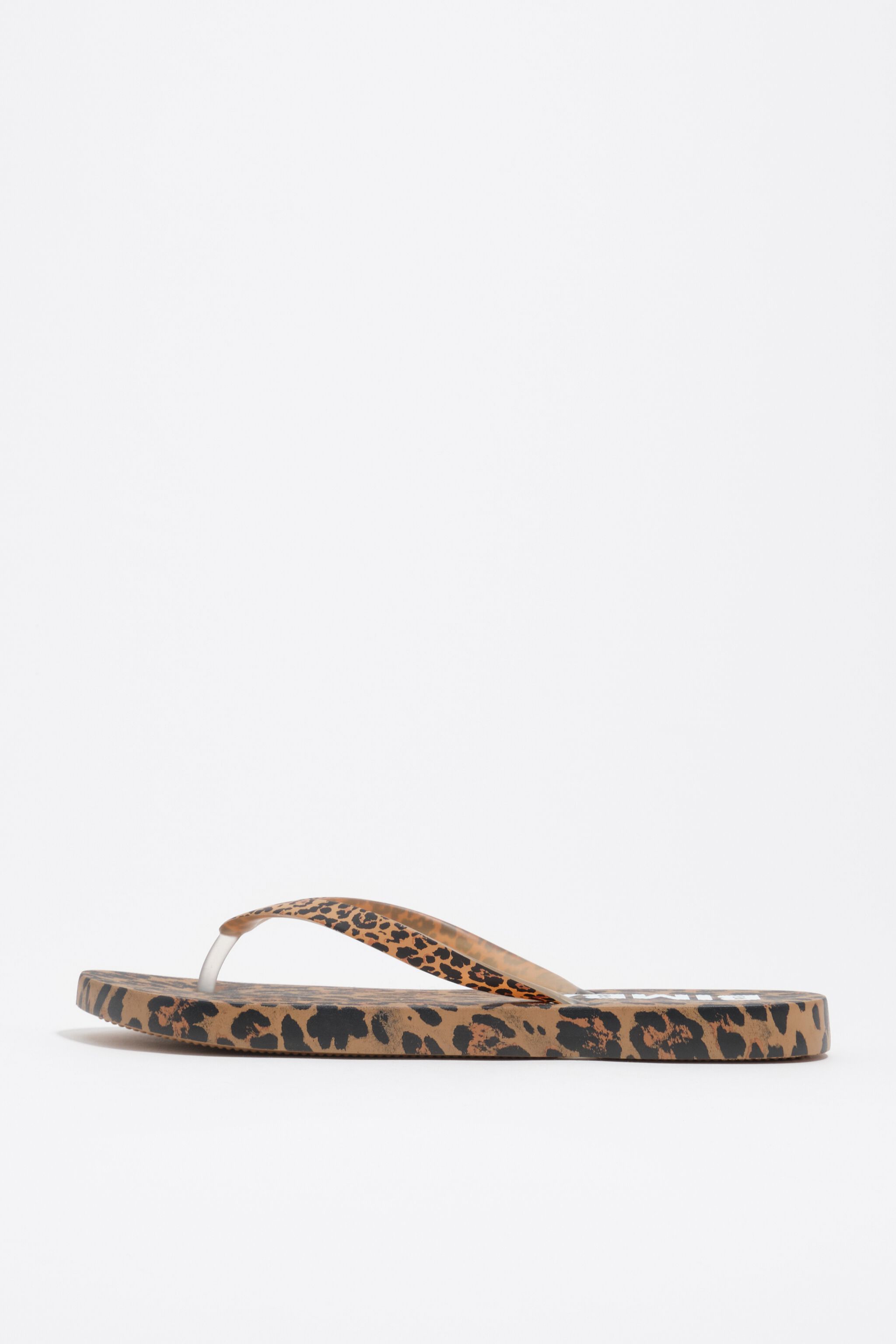 Naturlig leopard-sandaler