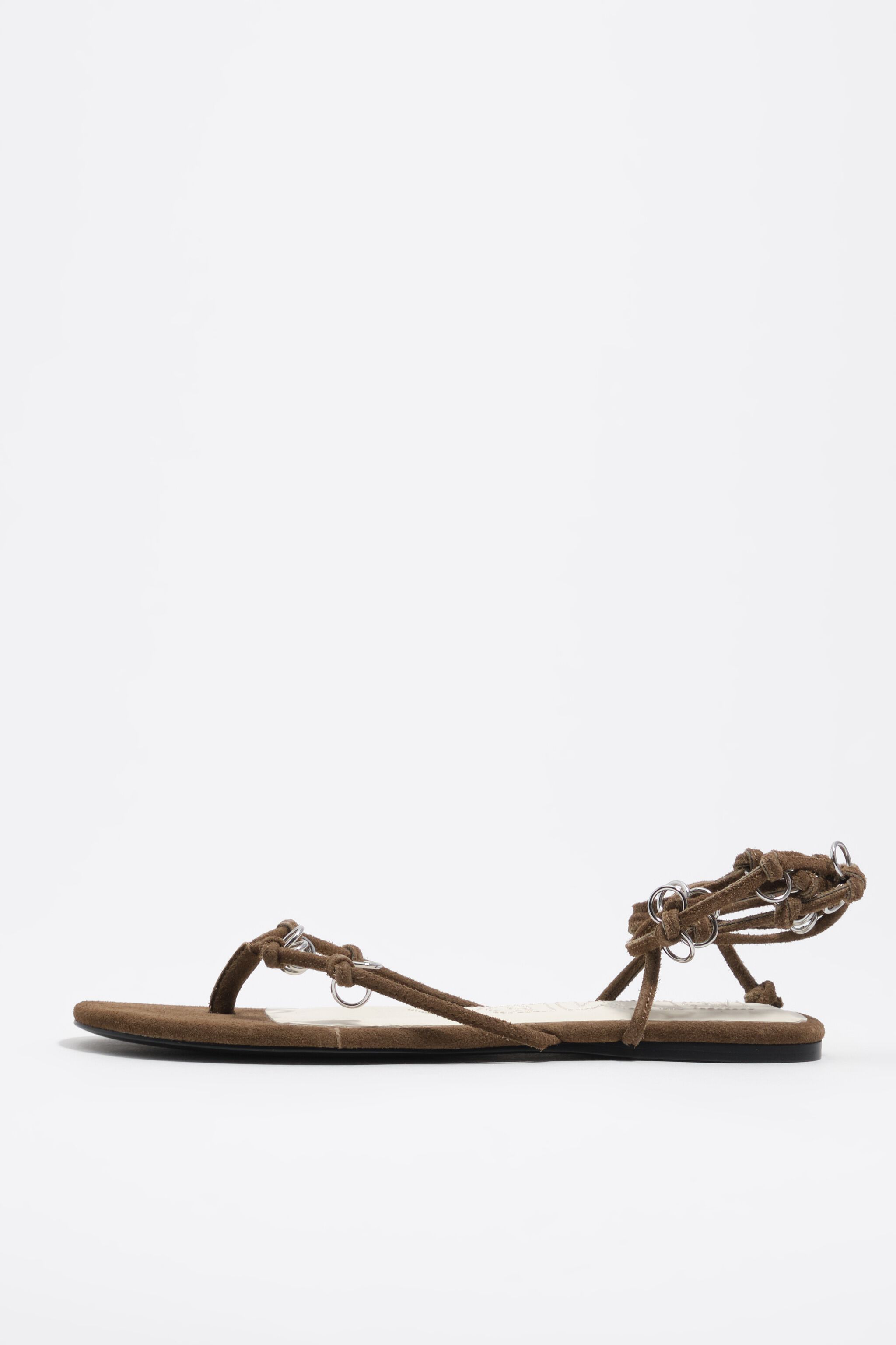 Olivgrön suddig sandal med genomgående hål
